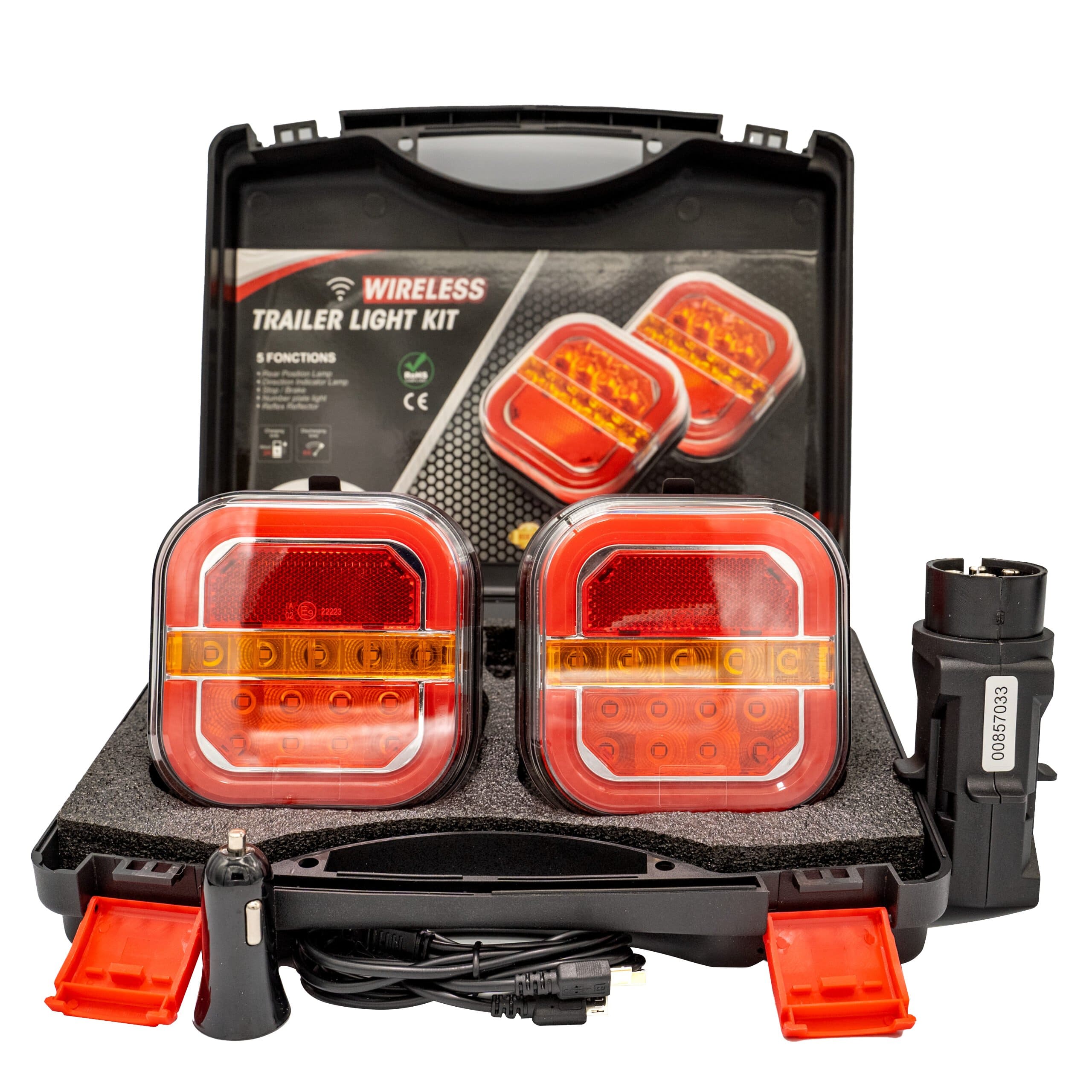 Draadloze LED achterlichtset met magneet: geopende koffer met twee lampen, radioconnector en kabels